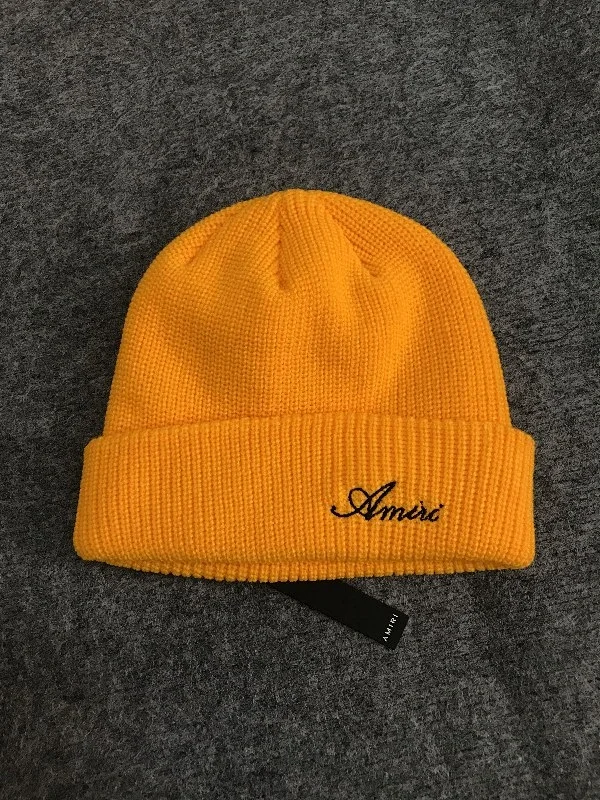 AMIRI Hats Ribbed cuffed knit beanie with embroidered three-star design product detail image 4