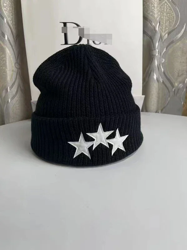 AMIRI Hats Ribbed cuffed knit beanie with embroidered three-star design product detail image 6