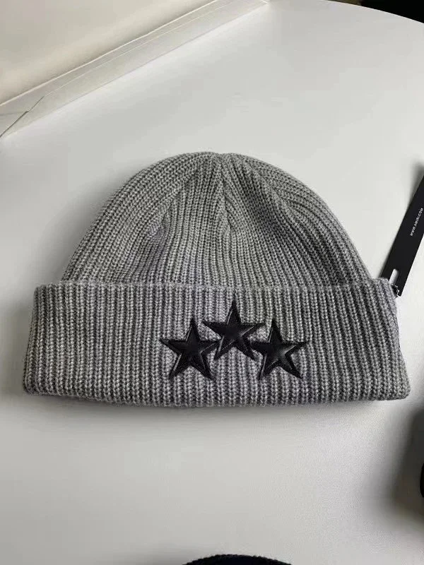 AMIRI Hats Ribbed cuffed knit beanie with embroidered three-star design product detail image 9