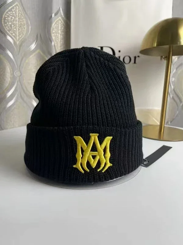 AMIRI Hats Ribbed cuffed knit beanie with embroidered three-star design product detail image 14