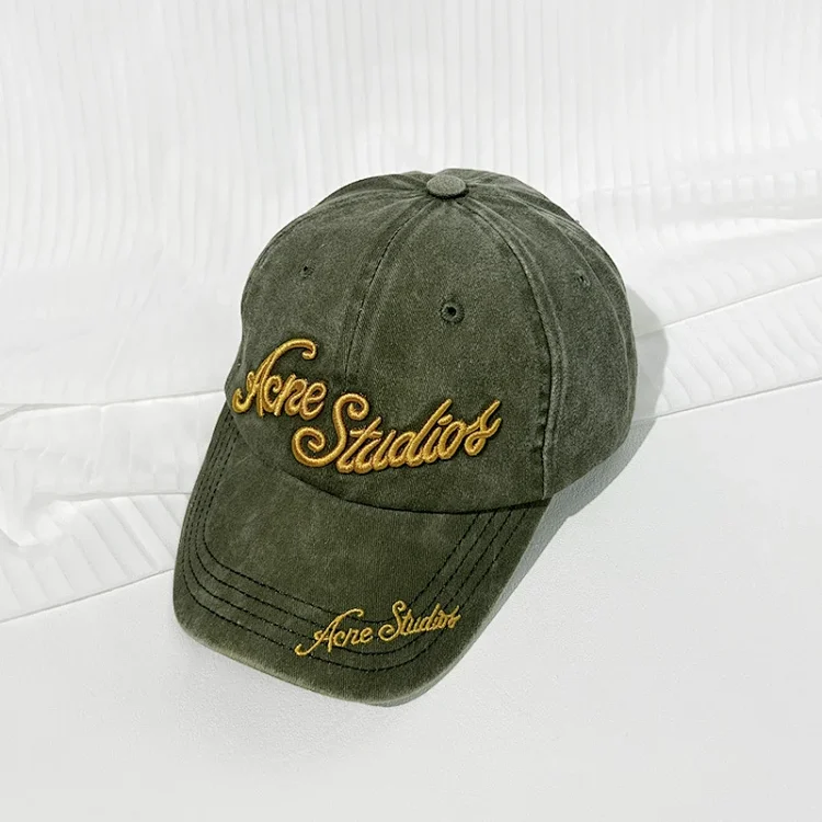 Catalog seller-listing image: Washed letter-embroidered baseball cap; not warehouse QC