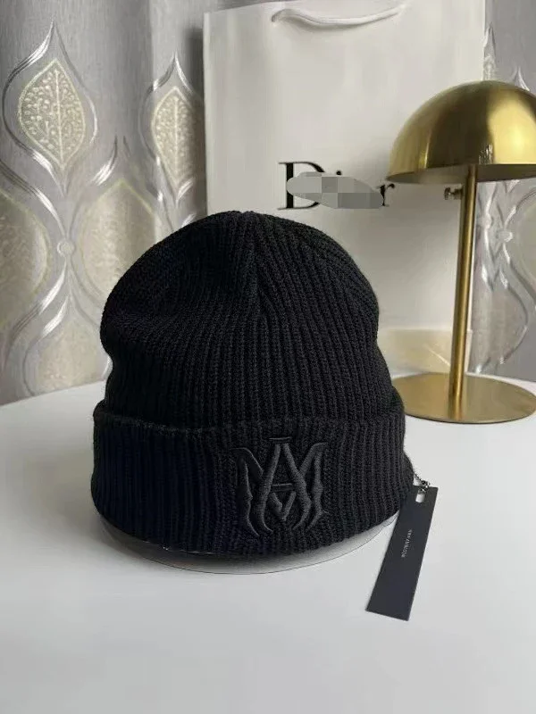 AMIRI Hats Ribbed cuffed knit beanie with embroidered three-star design product detail image 12