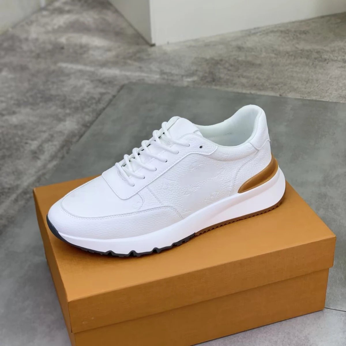 Louis Vuitton Run Away White Monogram Embossed Leather Sneakers Caramel Heel