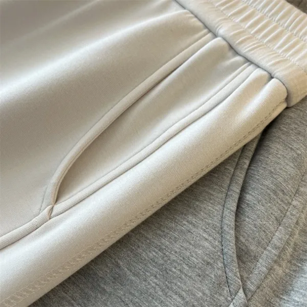 Design Three-Needle Five-Line Wide-Leg Pants in White and Gray - 11