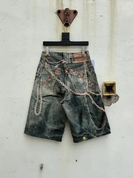 Acne Studios Distressed Denim Shorts with Chain Embellishments Blue - 3