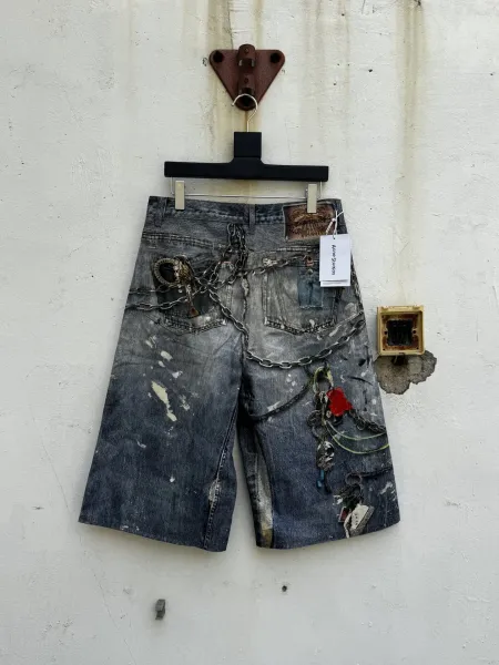 Acne Studios Distressed Denim Shorts with Chain Embellishments Blue - 12