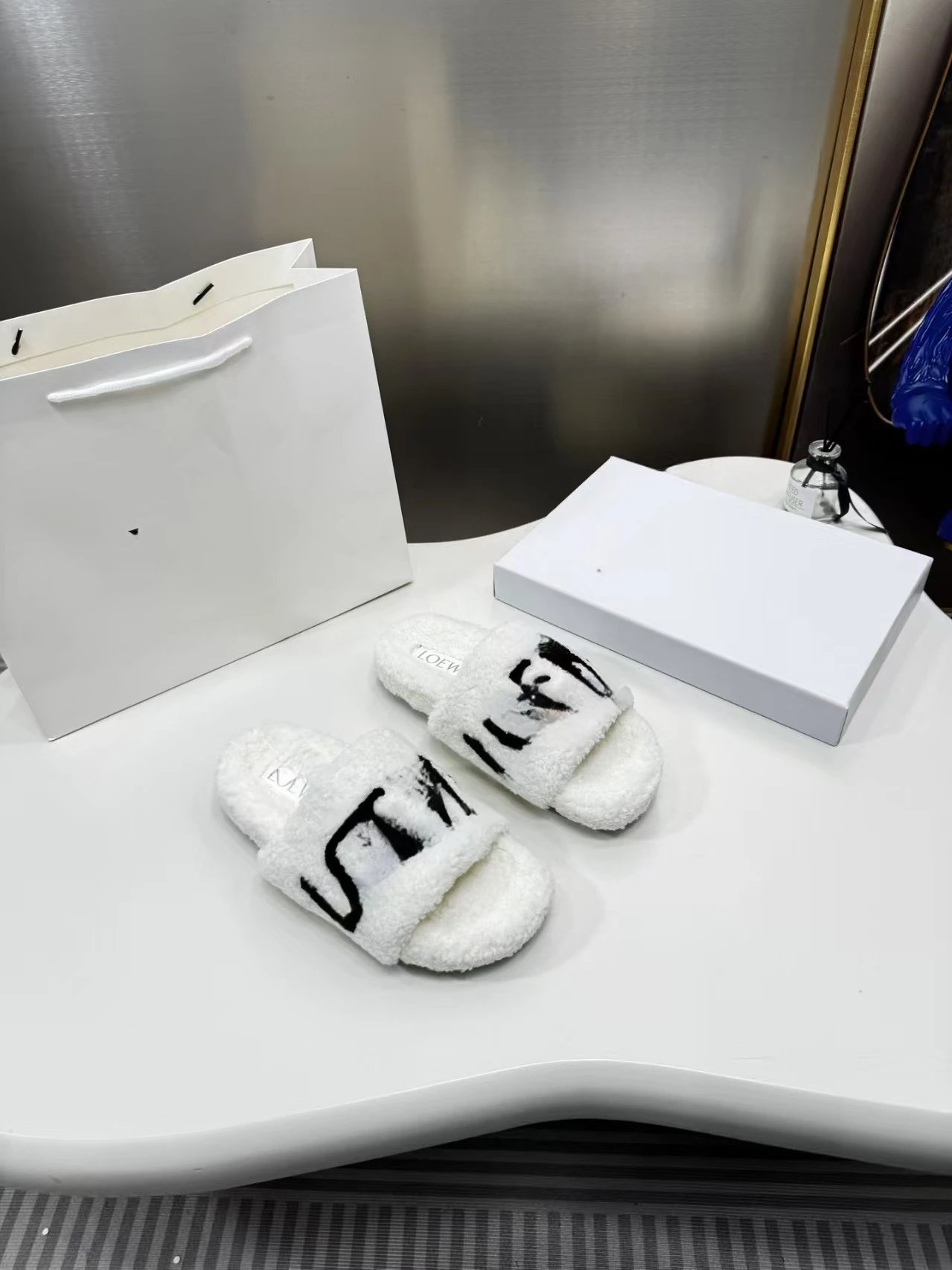 Loewe Anagram Fuzzy Slippers White