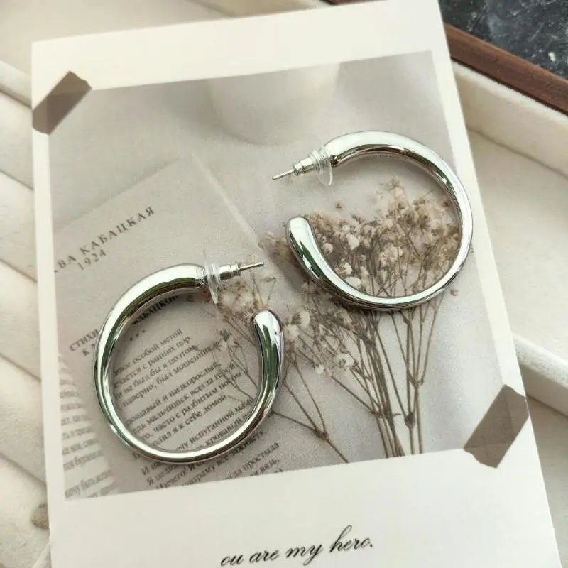 Silver Hoop Earrings with Asymmetrical C-Shaped Design Jewelry