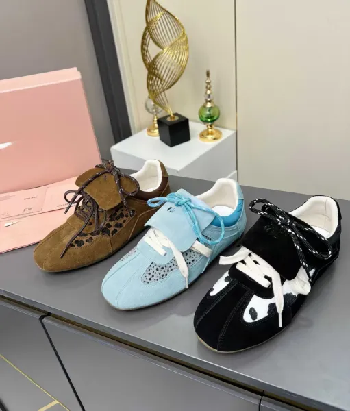 Miu Miu Cow Print Suede Sneakers - 2