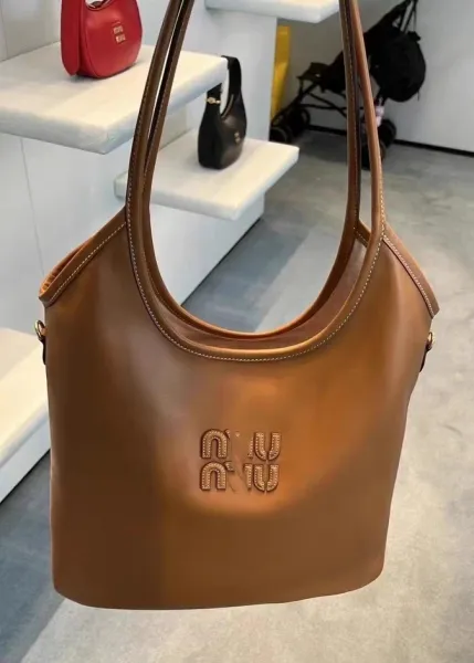 Miu Miu Logo-Embossed Distressed Brown Tote Bag - 27