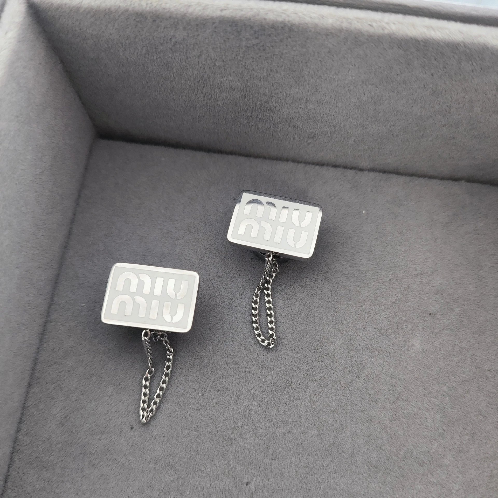 Miu Miu Logo-Embossed Silver Cufflinks with Chain Detail