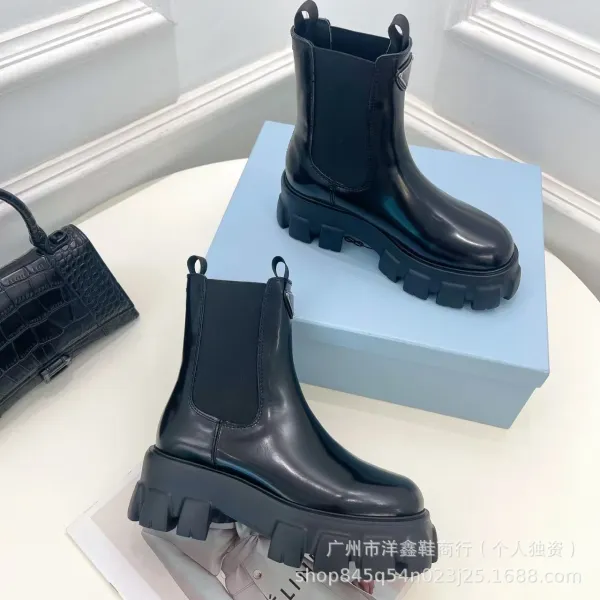 Prada Cleated Chelsea Boots Black - 9