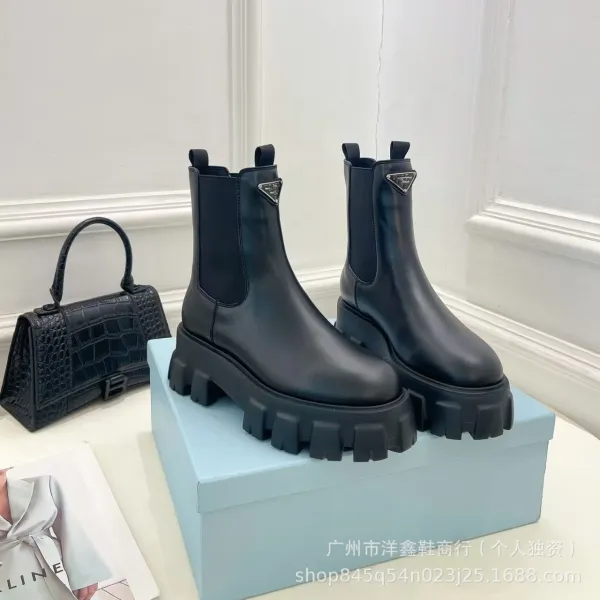 Prada Cleated Chelsea Boots Black - 13