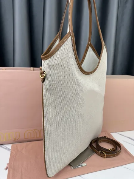 Miu Miu Logo-Embossed Distressed Brown Tote Bag - 34