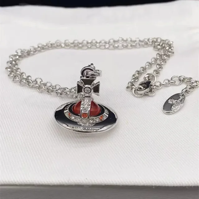 Unbranded Jewelry Saturn Orb Pendant Necklace with Cross Detail product detail image 3