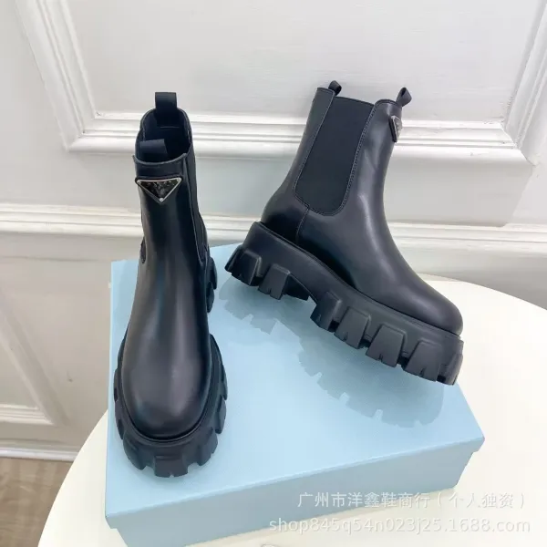 Prada Cleated Chelsea Boots Black - 14
