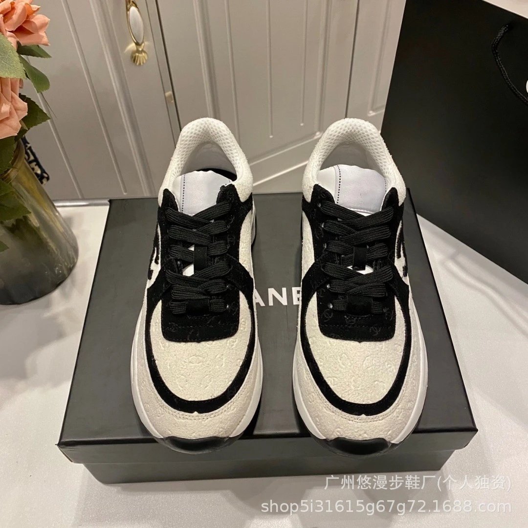 Chanel Runway Sneakers White Black Embossed Logo Chunky Sneakers