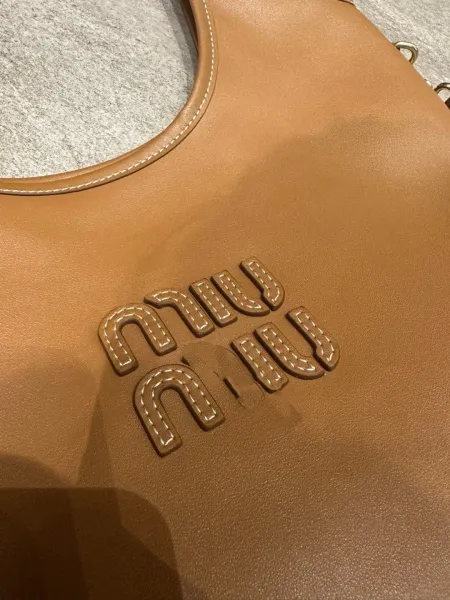 Miu Miu Logo-Embossed Distressed Brown Tote Bag - 31