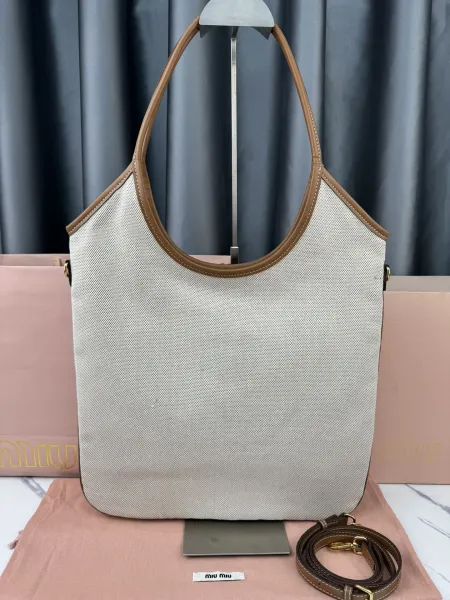 Miu Miu Logo-Embossed Distressed Brown Tote Bag - 33