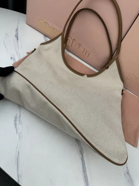 Miu Miu Logo-Embossed Distressed Brown Tote Bag - 36