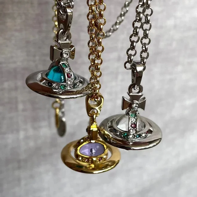 Unbranded Jewelry Saturn Orb Pendant Necklace with Cross Detail product detail image 1