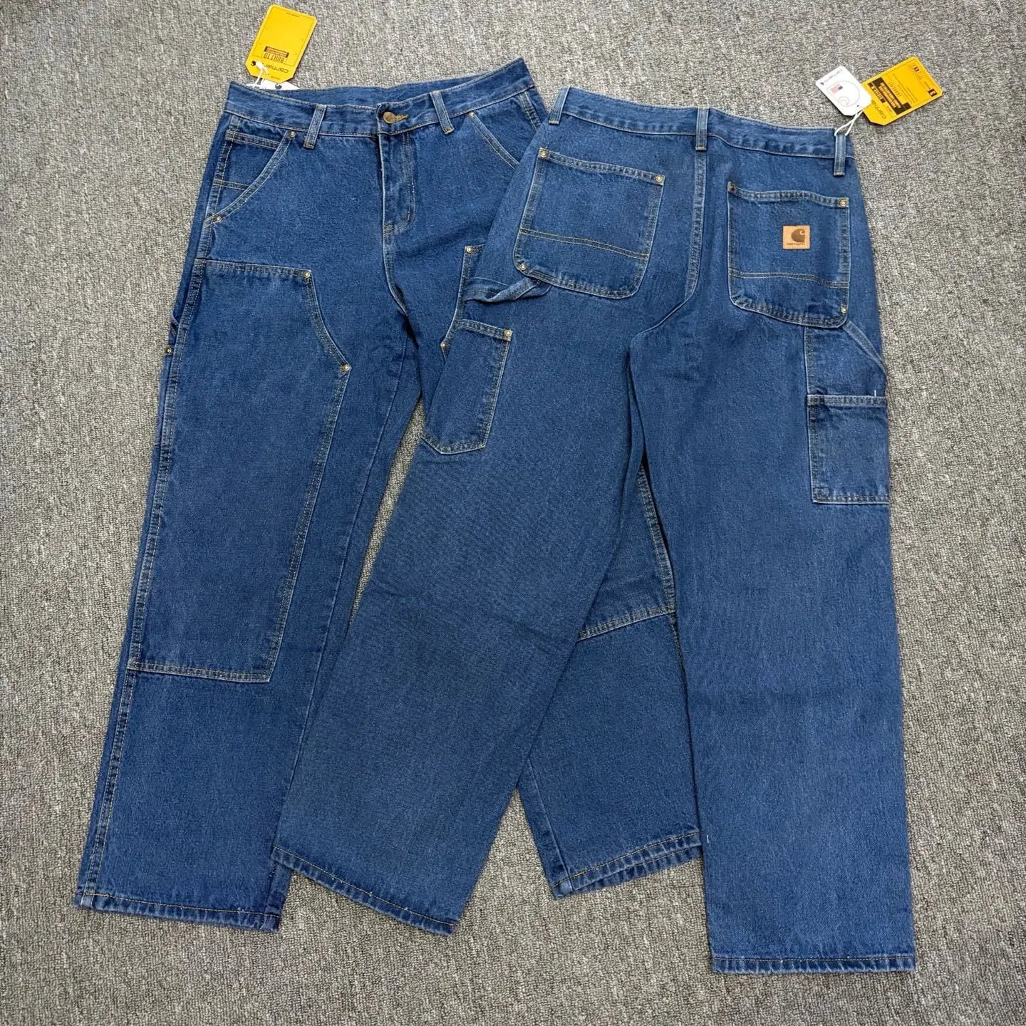 Carhartt Jeans Loose straight-leg carpenter with utility pockets — 608 blue leather tag