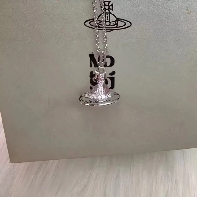 Unbranded Jewelry Saturn Orb Pendant Necklace with Cross Detail product detail image 11