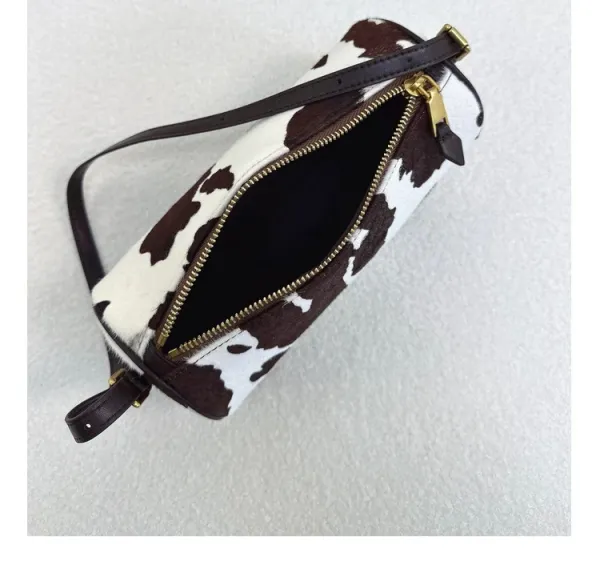 Cow Print Cylinder Shoulder Bag with Gold Hardware - 33