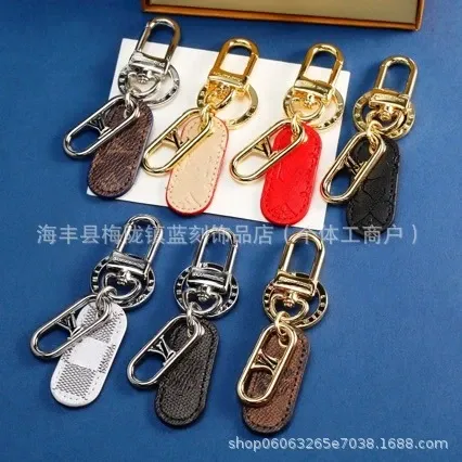 Louis Vuitton Key Holder with Leather Tag Gold Hardware - 2