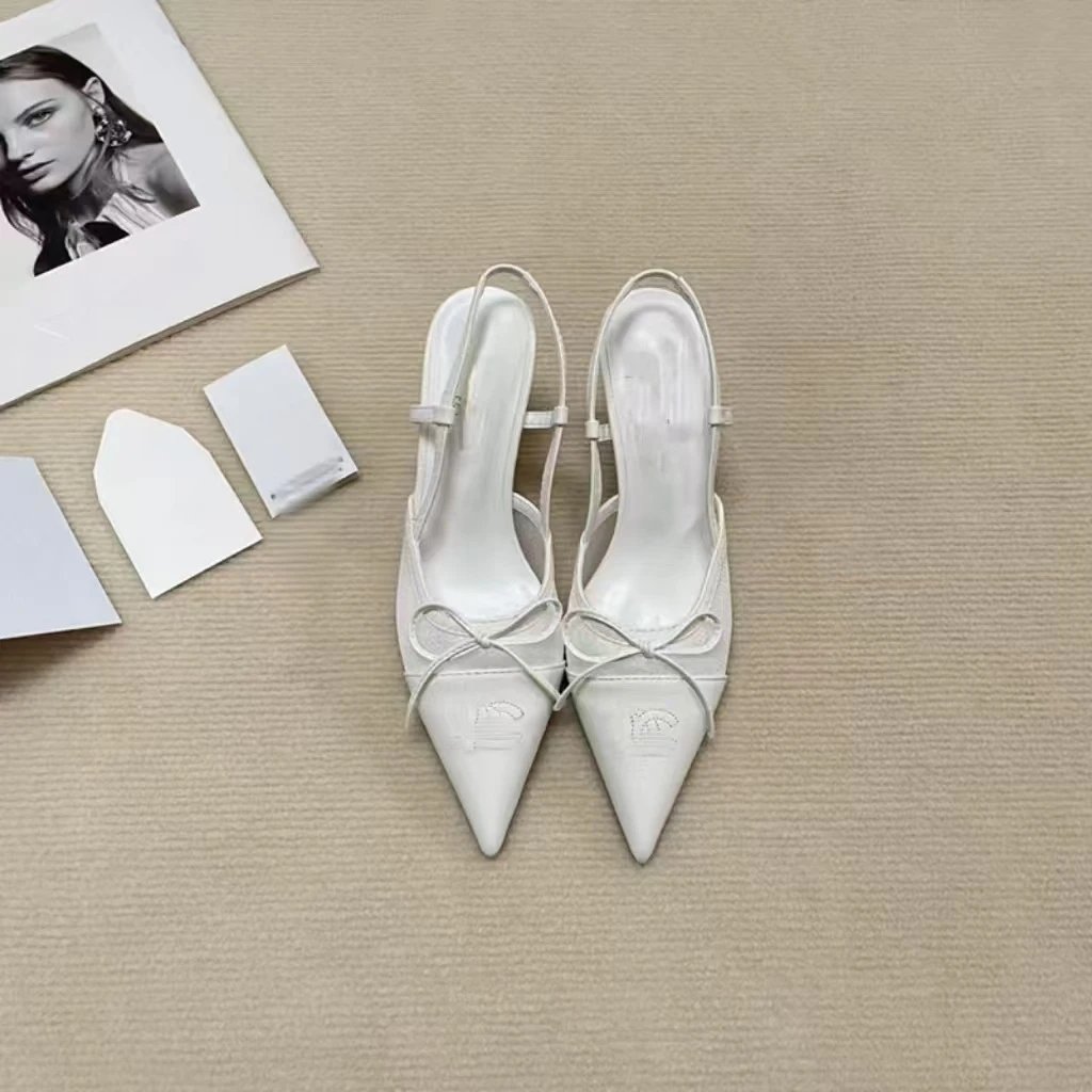 Chanel Two-Tone Bow Slingback Heels - 7