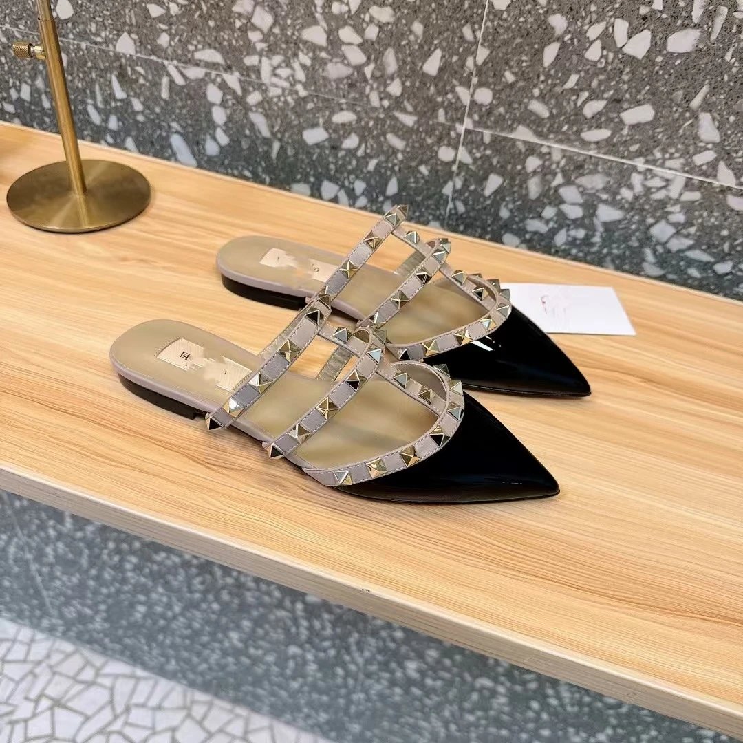 Valentino Garavani Rockstud Flat Mules Black and Silver