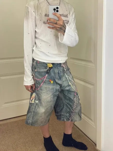 Design Custom Embellished Denim Shorts with Chain and Floral Appliqués - 14