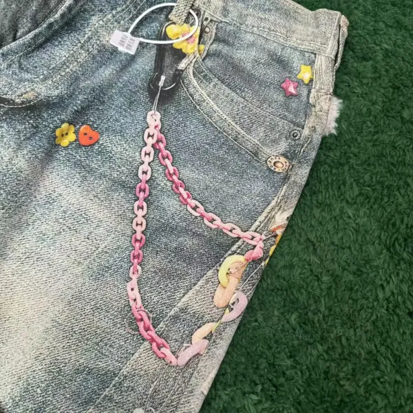Design Custom Embellished Denim Shorts with Chain and Floral Appliqués - 7