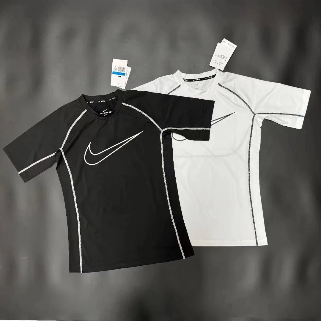 Nike Black and White Short Sleeve Tops