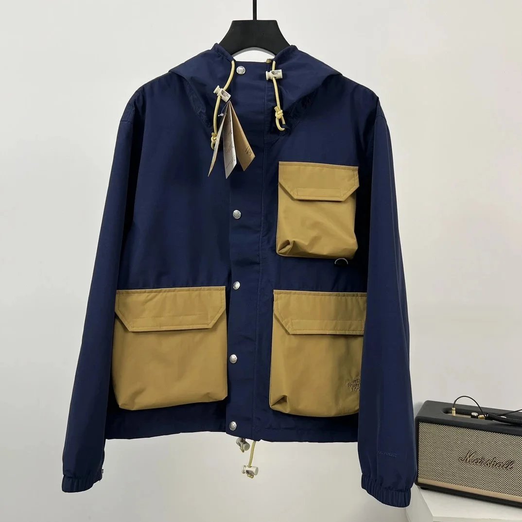 The North Face Jackets Multi-pocket hooded jacket — navy blue and brown