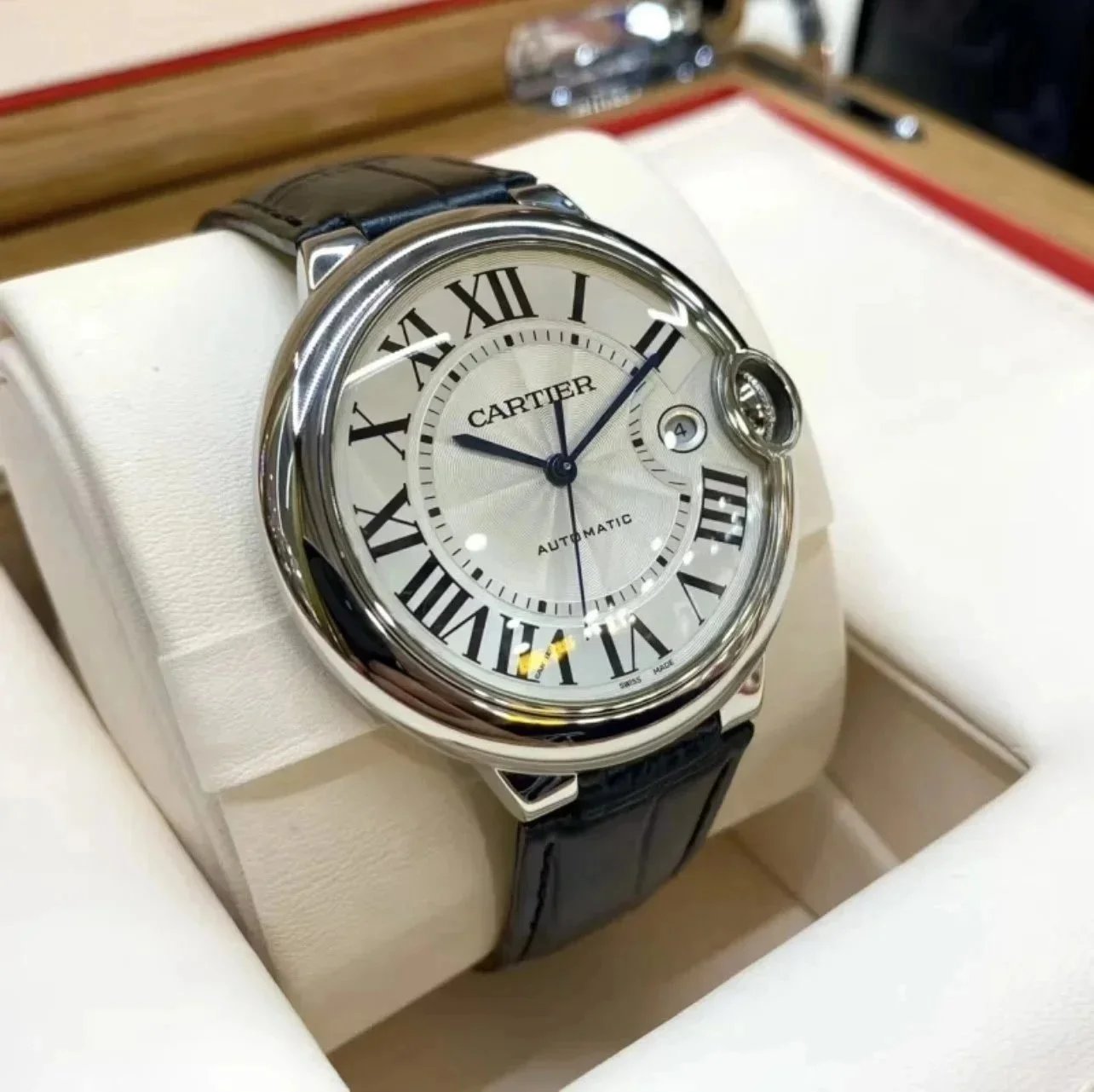 Cartier Ballon Bleu Watch - Silver Dial with Blue Sapphire Crown and Roman Numerals