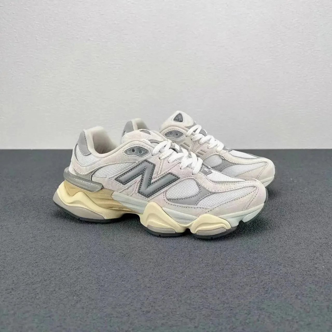 Off-white; runs one size small