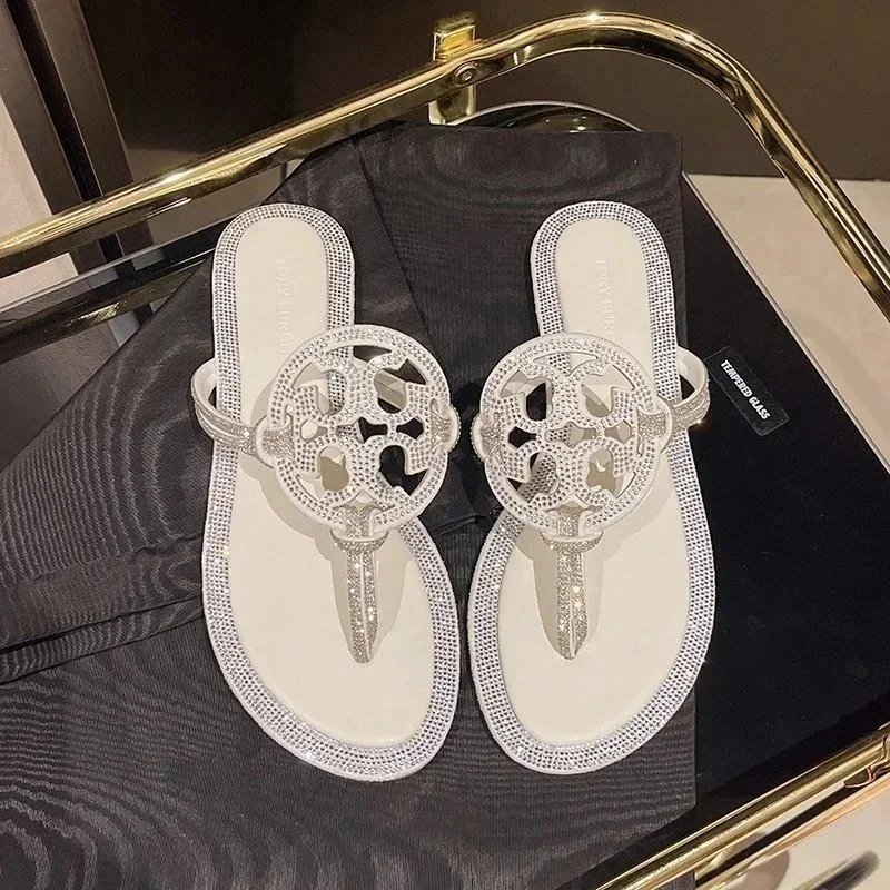 Tory Burch Slippers Rhinestone-Embellished Medallion Thong — White-TB halo setting