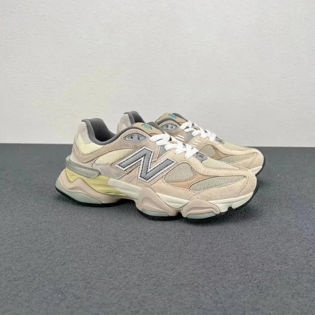 Light gray-pink, runs one size small