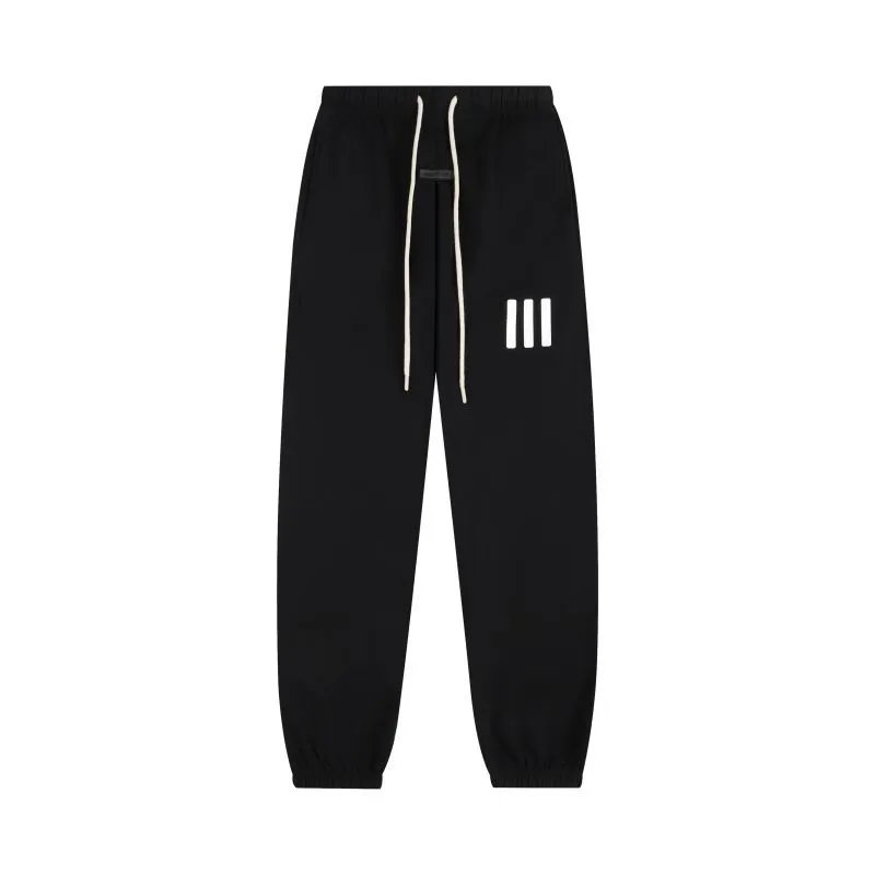 ESSENTIALS: Joggers with Small Lettering Print - rep spodnie