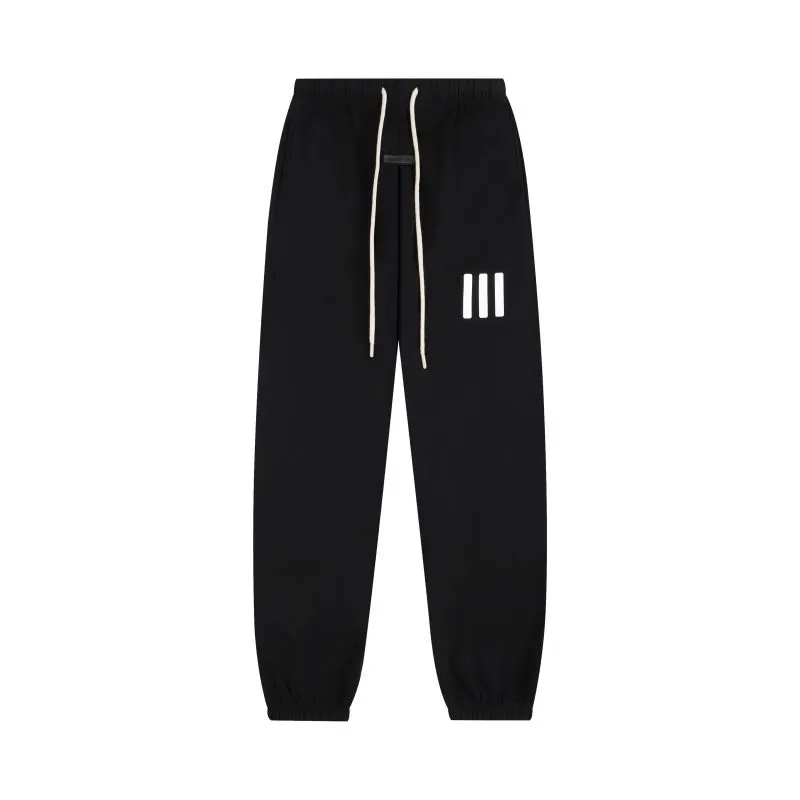 ESSENTIALS: Joggers with Small Lettering Print