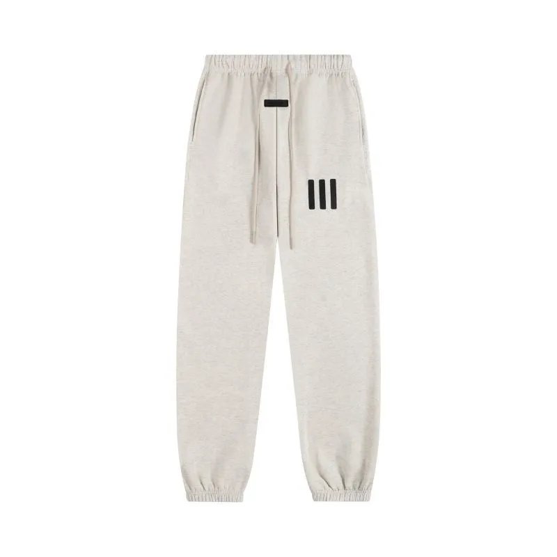 ESSENTIALS: Joggers with Small Lettering Print - rep spodnie