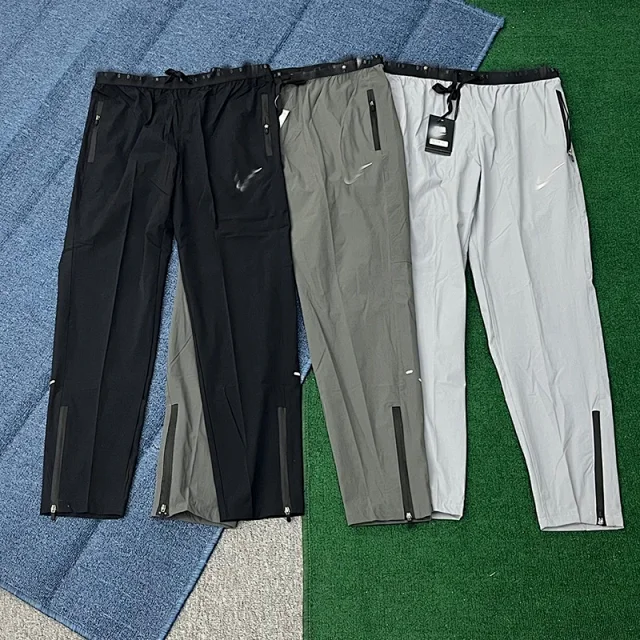 Nike Trousers Lightweight zip-ankle track product detail image 1