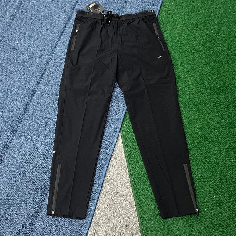 Nike Trousers Lightweight zip-ankle track image 2
