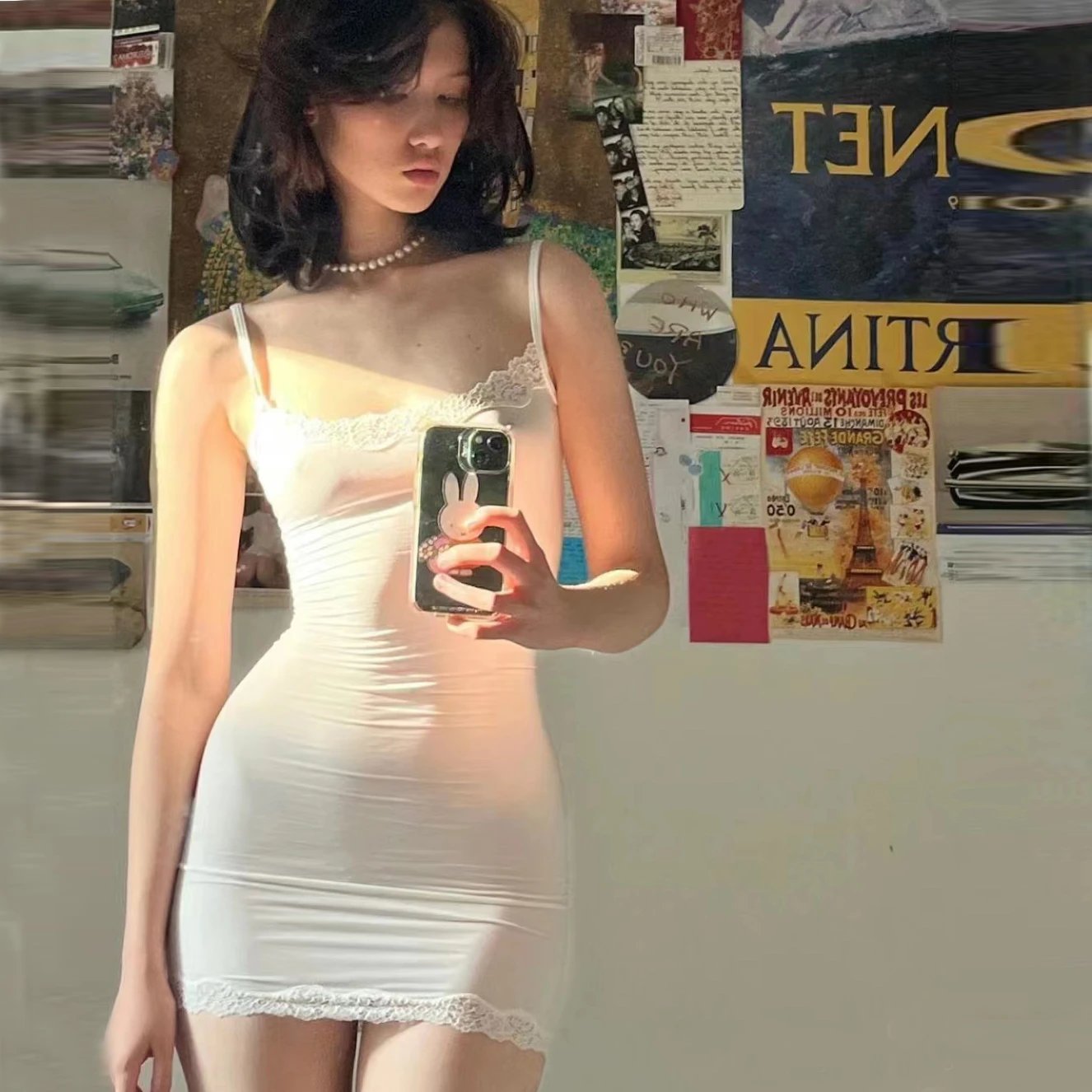 Lace-Trimmed Bodycon Dress and Leather Corset-Style Mini Dress