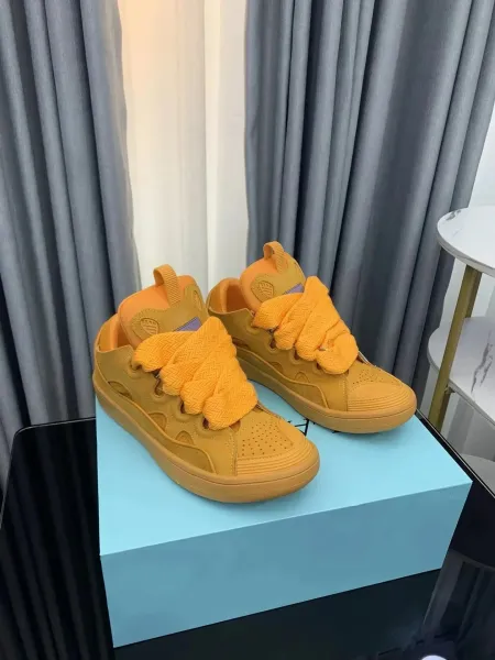 Design Chunky Platform Sneakers in Mustard Yellow with Braided Laces - 1