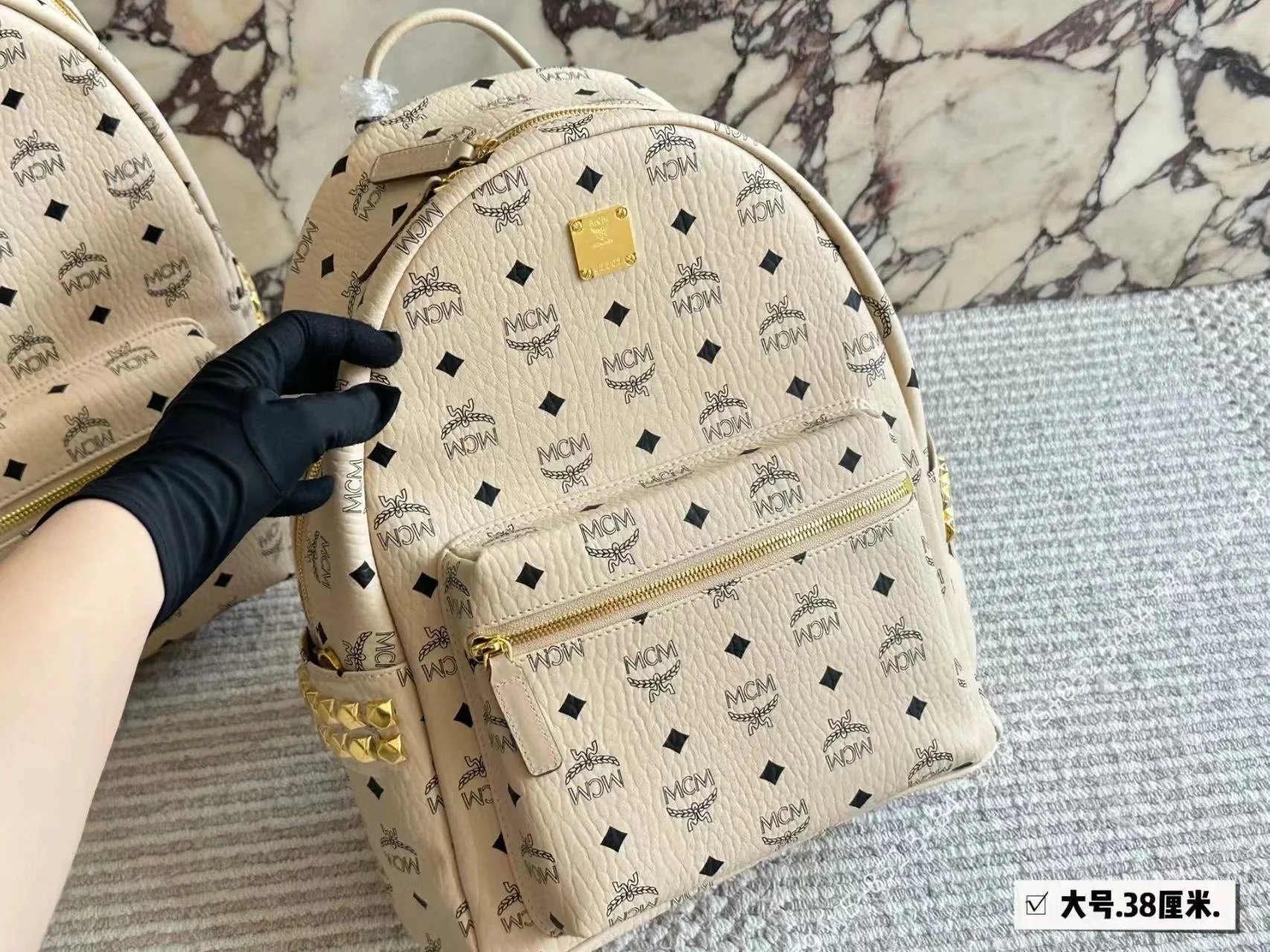 MCM Backpacks Visetos logo-print studded backpack — Beige 38*30cm