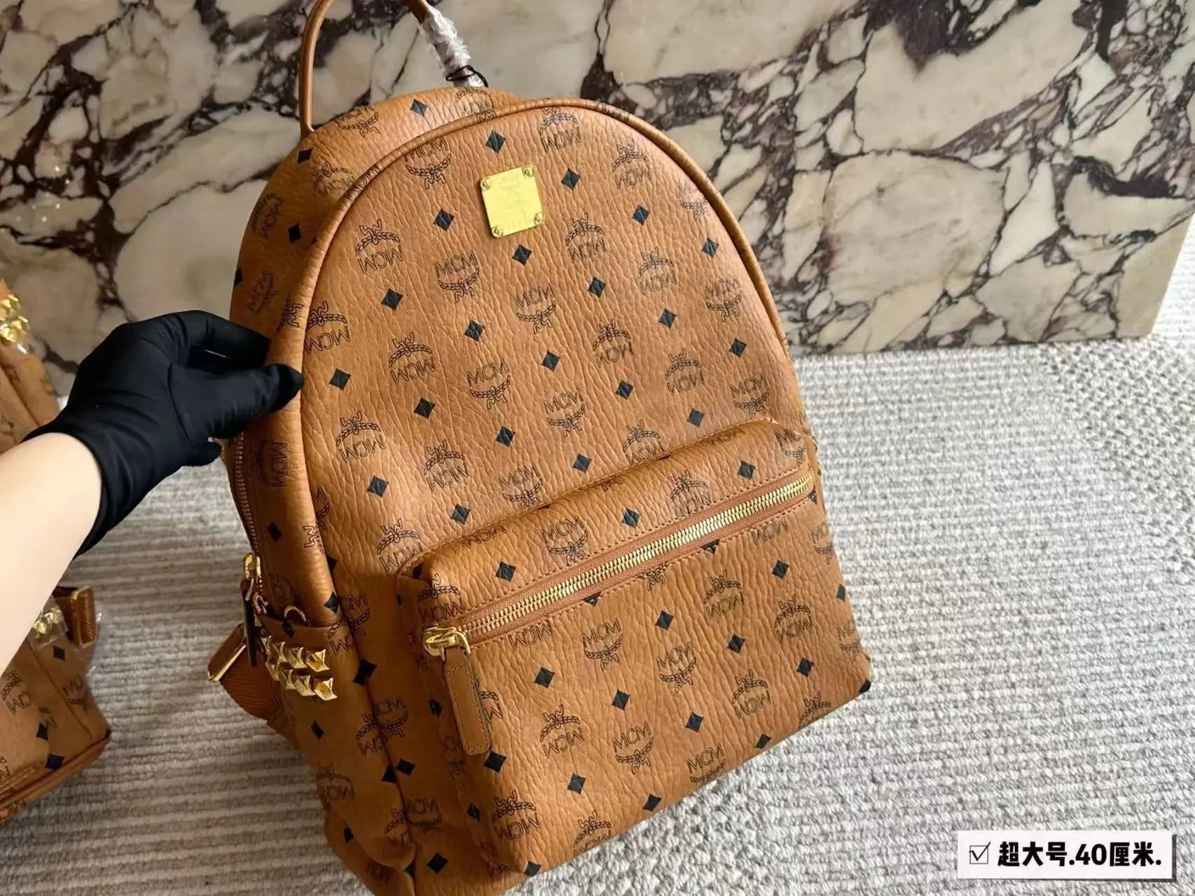 MCM Backpacks Visetos logo-print studded backpack — Brown 40*32cm
