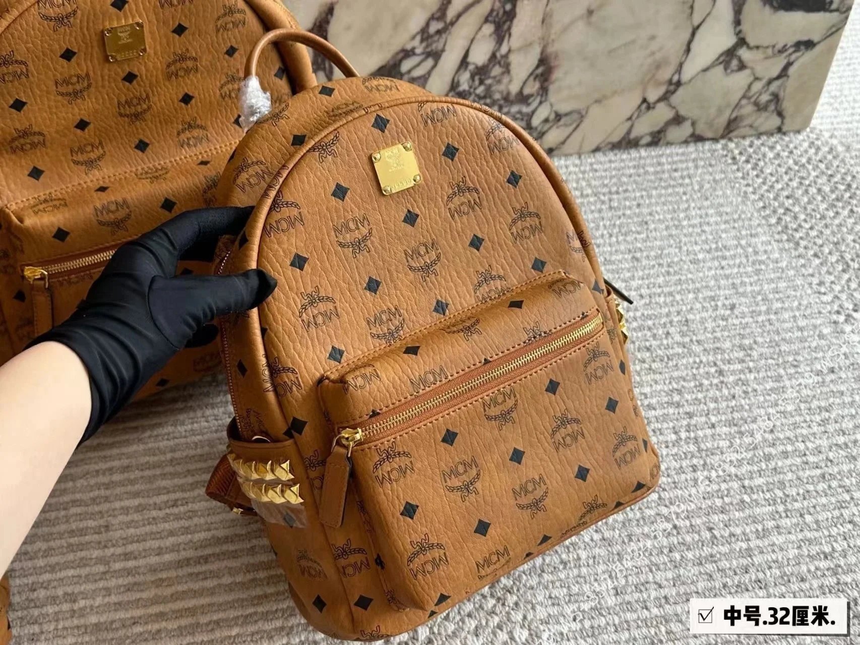 MCM Backpacks Visetos logo-print studded backpack — Brown 32.26cm