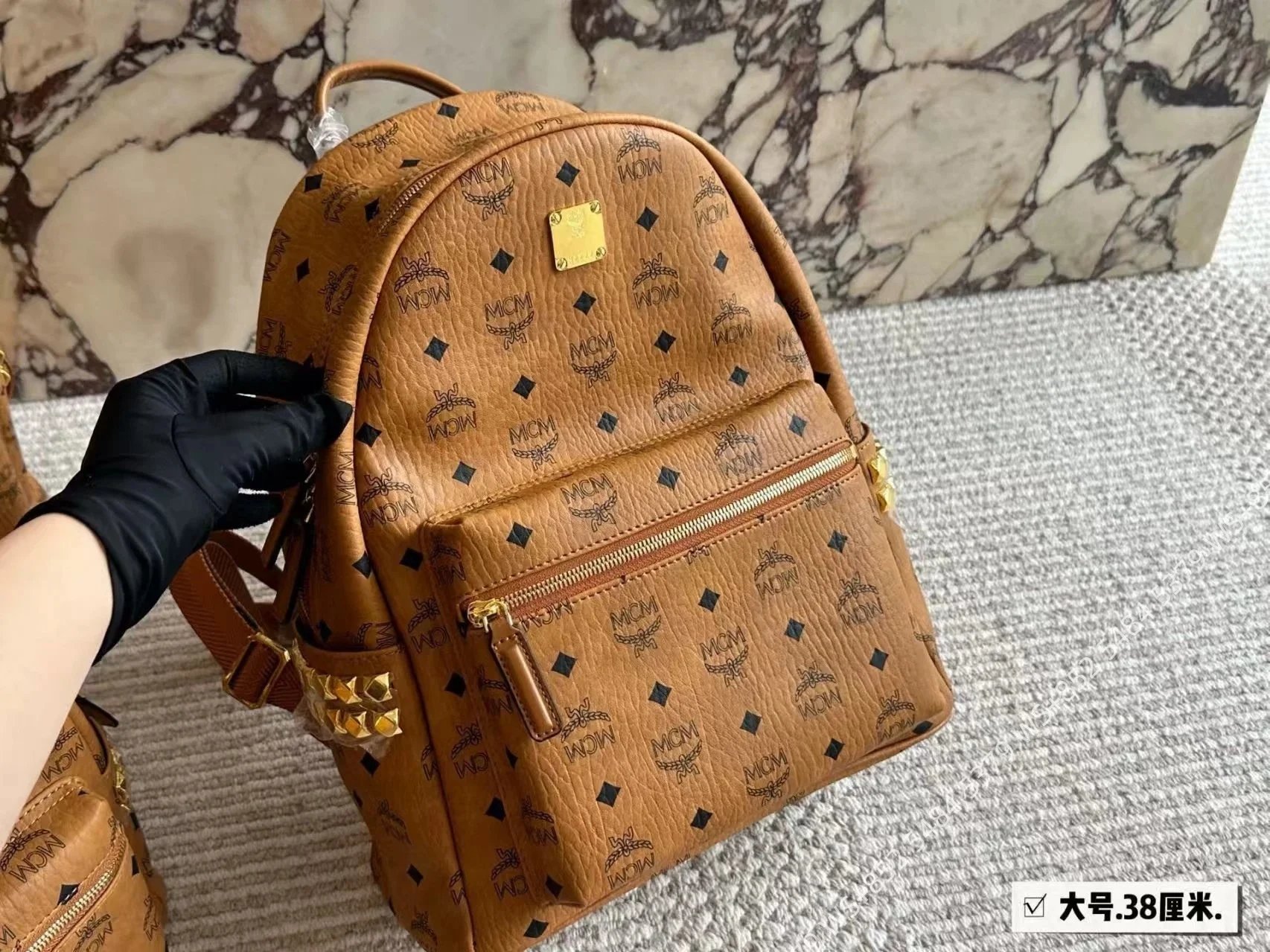 MCM Backpacks Visetos logo-print studded backpack — Brown 38*30cm